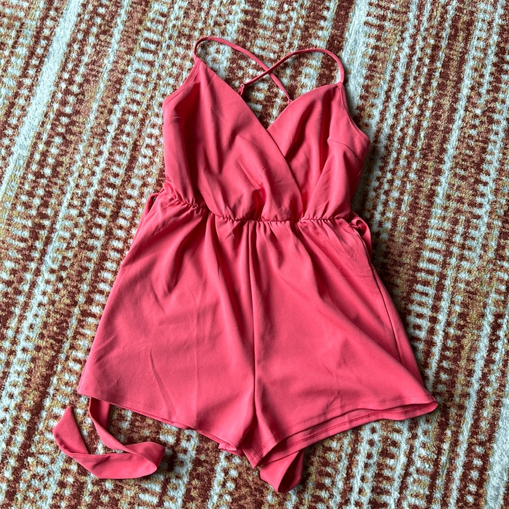 Coral romper with adjustable straps